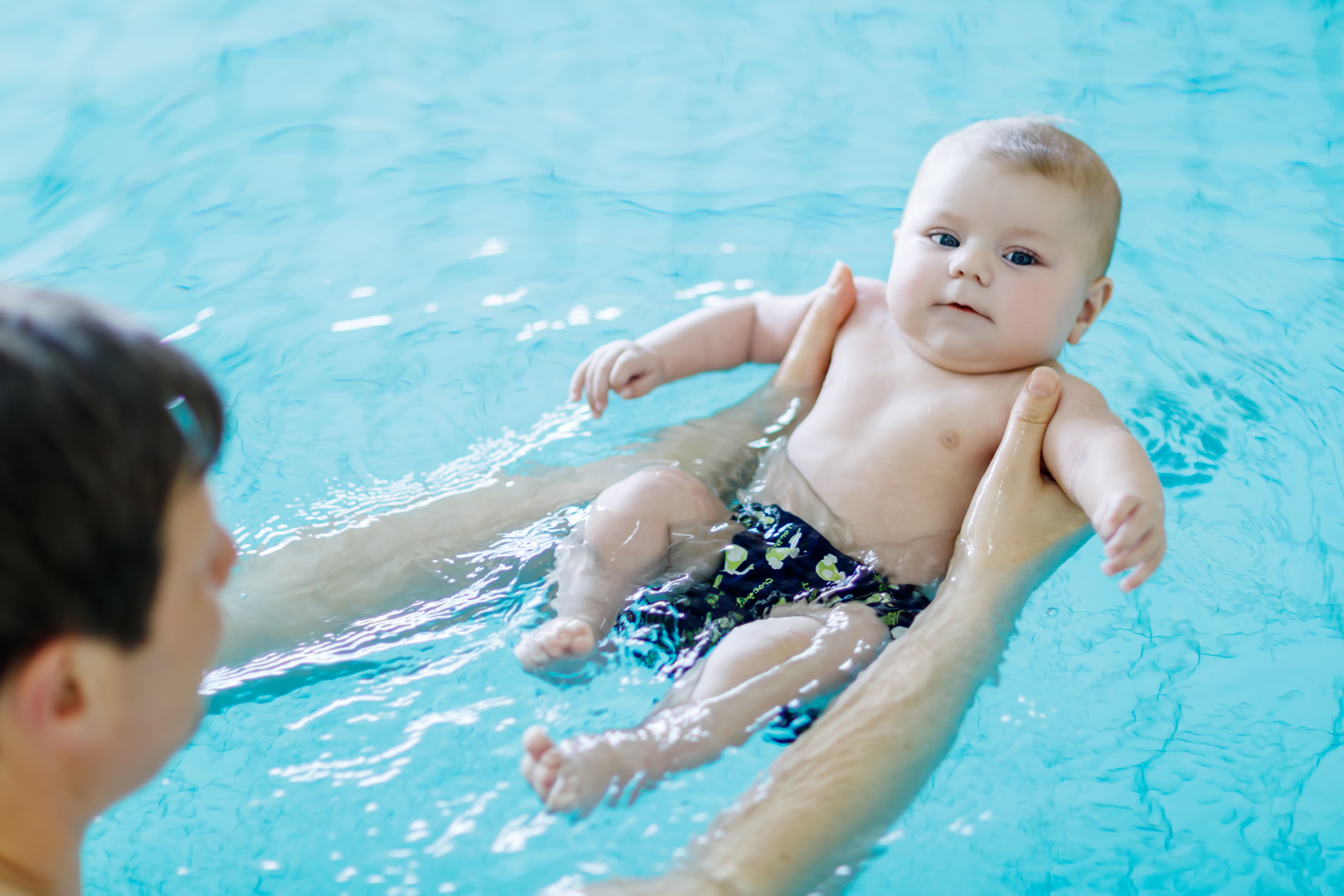 Baby and dad Swimming